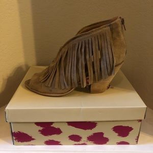 Suede semi-wedge bootie.